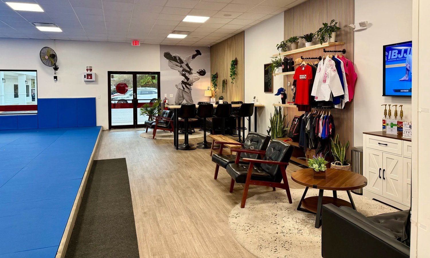 Lounge seating, Gracie Barra uniforms and the welcoming school entrance